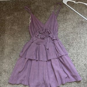 Romper with front cut out and bow detail